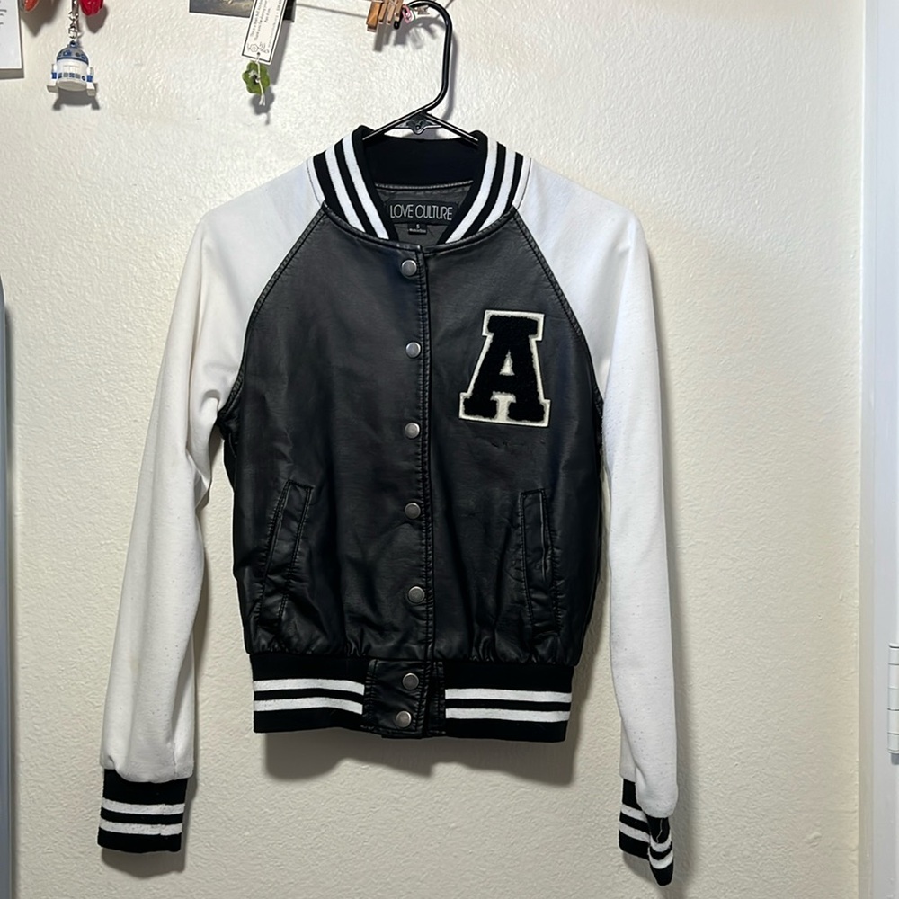 Love Culture BRAND: varsity/ bomber/ letterman jacket in black and white.